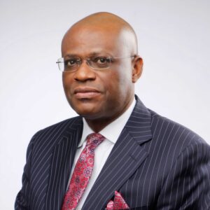 A black man in suits wearing glasses